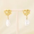 Detailed close-up of golden heart knot earrings with white baroque pearl pendants - Gold Heart Knot (KE115979-GC)