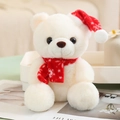 Cute cream Christmas teddy bear plush with red snowflake scarf and hat in cozy setting - Style A Snowflake Scarf / White