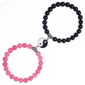 Detail of Yin Yang magnetic couple bracelets with black matte and pink textured beads - Black and Pink Magnetic Tai Chi (Style-2)