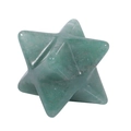Macro shot of 3D green crystal Merkaba star pendant with polished translucent texture - Green Aventurine