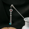 Ethnic silver hairpin with turquoise beads and tassel displayed in a ceramic vase - Silver/F292/Ruby Lotus Tassel