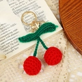 Handmade crochet cherry keychain with red fruit and green leaves on gold metal ring - Style 6