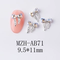 Vue macro de bijoux d'ongles en nœud argenté avec strass AB, taille 9,5x11mm - Nœud Blanc Clair de Lune Base Argentée (AB71)
