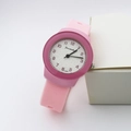 Detail of the white textured watch dial with black Arabic numerals and soft silicone strap - Pink