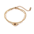 Close-up of dual-layer gold-plated chain bracelet with an oval brown gemstone inlay - Double-layer Snake & Paperclip Tiger Eye Style (31980)