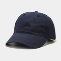 Detailed side view of a navy cotton baseball cap showing reinforced stitching and eyelets - Adjustable / Navy Blue