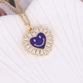 Golden sun flower necklace with blue heart smiley enamel and sparkling zircon inlay - Dark Blue