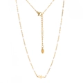 Detail of Ankh cross necklace with white beads on polished stainless steel chain - Gold White Beads