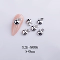 Macro view of 8x8mm silver metal heart peach nail art charms on a pink nail tip - 3D Realistic Peach Style (MZH-8006) / 50 Pieces / Silver