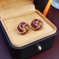 Vintage style knot earrings with dark red enamel and gold finish in a jewelry box - Silver Earring Post Deep Red Knotted Enamel Stud Earrings