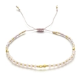 Detailed macro view of bohemian handmade pink crystal bead bracelet with adjustable cord - Pink