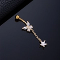 Close-up of golden butterfly belly ring with sparkling zircon and star-shaped pendant - Butterfly Chain Gold