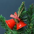 Red Christmas bells with striped ribbon bow and red berries hanging on tree branch - Red Double Trumpet Bell