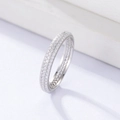 Detailed macro view of high-quality S925 sterling silver triple-row micro-pave eternity ring - US 5 / Silver