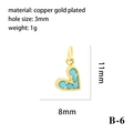 Dettaglio macro del ciondolo a cuore turchese 11x8mm in rame placcato oro 18K e modello B-6 - 11x8mm (B-6) / Oro (Zircone Turchese)
