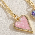 Pink shell heart pendant necklace with gold chain and sparkling zircon border - Pink