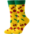 Detailed close-up of yellow socks with red cherry patterns and green ribbed cuffs - Yellow Cherry