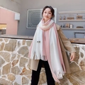 Pink and white color-block knitted scarf with tassels and small brand tag on model - Pink and White