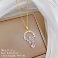 Close-up of a floral pendant necklace with pink zircons and product dimensions listed - Gold Flower Pendant Style (G221)