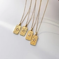 Golden tarot square pendants featuring The World, Sun, Moon, and Star on snake chains - The World Necklace