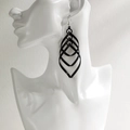 Fashionable black layered geometric rhombus earrings with glitter finish on model - NRXY-1380-1 Black Glitter