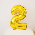 Golden number 2 foil balloon on a white pedestal for birthday party celebrations - Number 2 / 16" / Gold