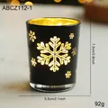 Matte black glass candle holder with golden snowflake design, dimensions 7.2x5.5cm - Black Snowflake Hollow Glass Cup (No Candle)
