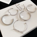 Macro di set di braccialetti d'argento lucido con vari disegni geometrici e fiocchi - Argento