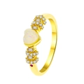 Golden heart opal ring with pavé diamonds and a subtle ruby accent on the band - Gold - Opal Heart Luxury