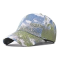 Detail of baseball cap with colorful tie-dye print and sparkling crystal bear motif - Adjustable / Bear Green
