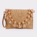 Natural straw clutch bag featuring woven textures, pom-poms, tassels, and a wrist strap - Khaki Pompom