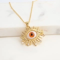 Vergoldete Evil-Eye-Halskette mit orangefarbener Glitzerpupille und funkelnden Kristallen - Orange