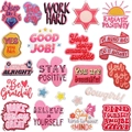 Various motivational quote embroidered patches in colorful heart and speech bubble shapes - Assorted Inspirational Slogan Styles