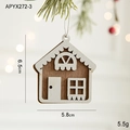 Nordic wooden Christmas cabin ornament with white cutout design on pine branch - House