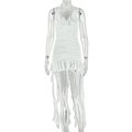 Detail of white halter neck dress featuring ruffled V-neck and layered fringe hemline - S / White
