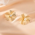 Exquisite hollow flower stud earrings in gold finish with central crystal accent - Grid Flower