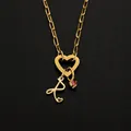 Elegant stainless steel necklace featuring heart clasp, letter R and pink zircon pendant - Letter R