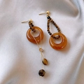 Detailed view of resin leopard print earrings with faux tiger eye beads on silk fabric - Asymmetric Tiger Eye Hoop Drop Earrings (925 Sterling Silver Earring Post)