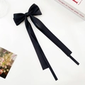 Detail of elegant black satin bow hair clip with long ribbons on white surface - Double Streamer Bow - Alligator Clip / Black