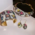Bold 4-piece golden jewelry set with colorful rhinestone leopard pattern in box - 4-Piece Set Gold Multi-color Leopard Print