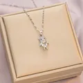 Elegant silver titanium necklace featuring a sparkling teddy bear pendant with a heart stone - 6050 Heart Bear / Silver