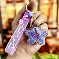 Purple flower oil-dripping keychain with sand, shells, bell and Happy Moments strap - Purple