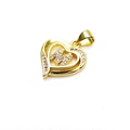 Detailed close-up of a gold-plated heart pendant with letter M and sparkling zircon stones - Letter M