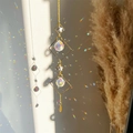 Detailed macro view of a golden geometric crystal suncatcher creating rainbow light spots - Rhombus Frame Star Style (07)