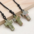 Green and pink natural stone cross necklace with black woven cord and decorative bead - Unakite