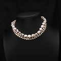 Three-layer Baroque freshwater pearl necklace with gold beads on a black bust display - Light Luxury Four Layers