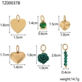 Detailed view of six gold-tone pendants including green resin flowers and heart charms - TZ00037B-1 (Green Stone/Rose Set)