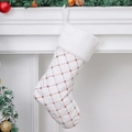 White and gold sequin Christmas stocking with plush cuff hanging on a festive mantel - Large White