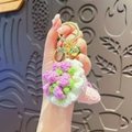 Pink and white handmade crochet mini bouquet keychain with golden bell and lobster clasp - Pink Rose