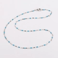 Silver thin chain necklace with turquoise oval beads in a decorative S-shaped layout - Steel + Lake Blue Enamel